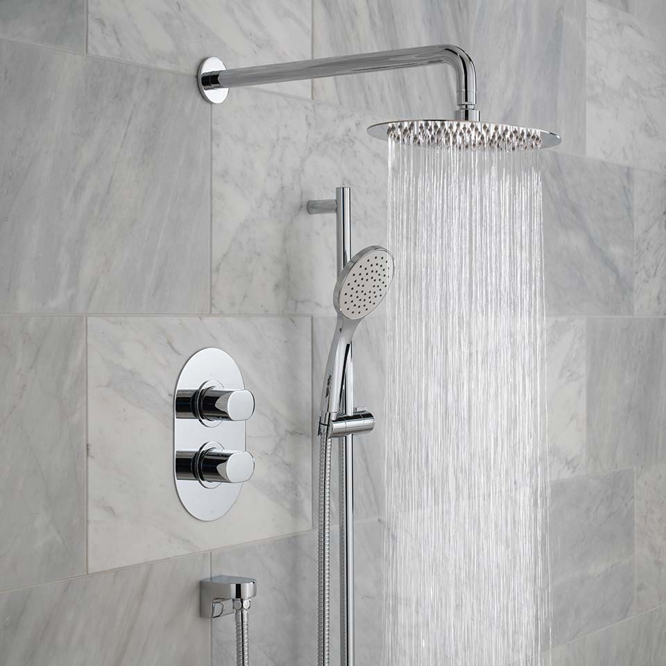 large shower head with marble tiles